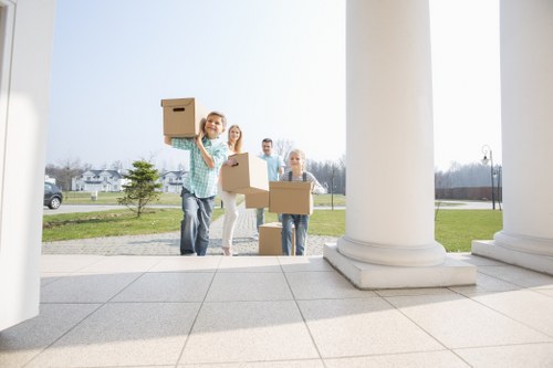 Careful packing of household items in Kingston before moving day